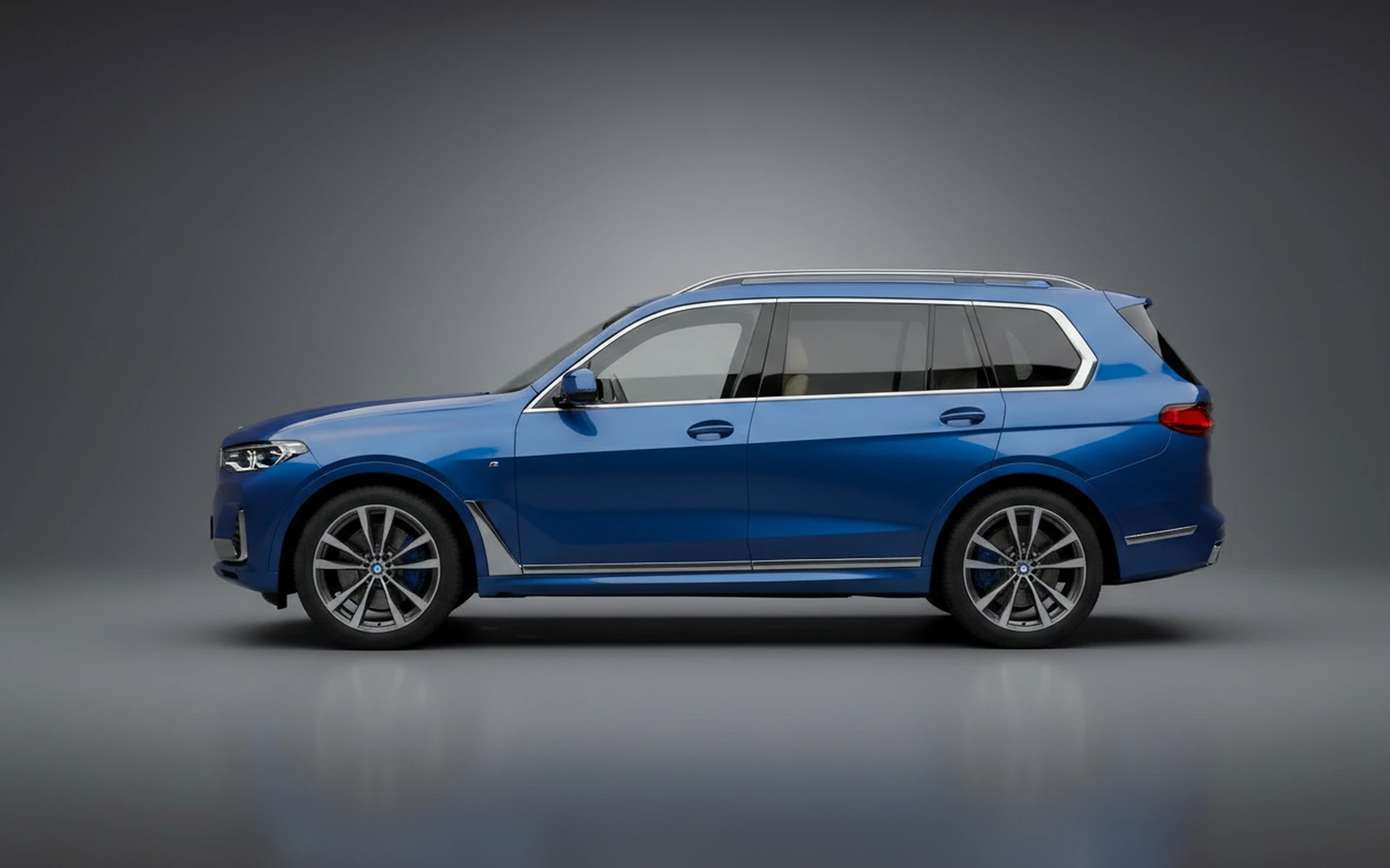 BMW X7 xDrive40i Blue 2024 — exterior rear view