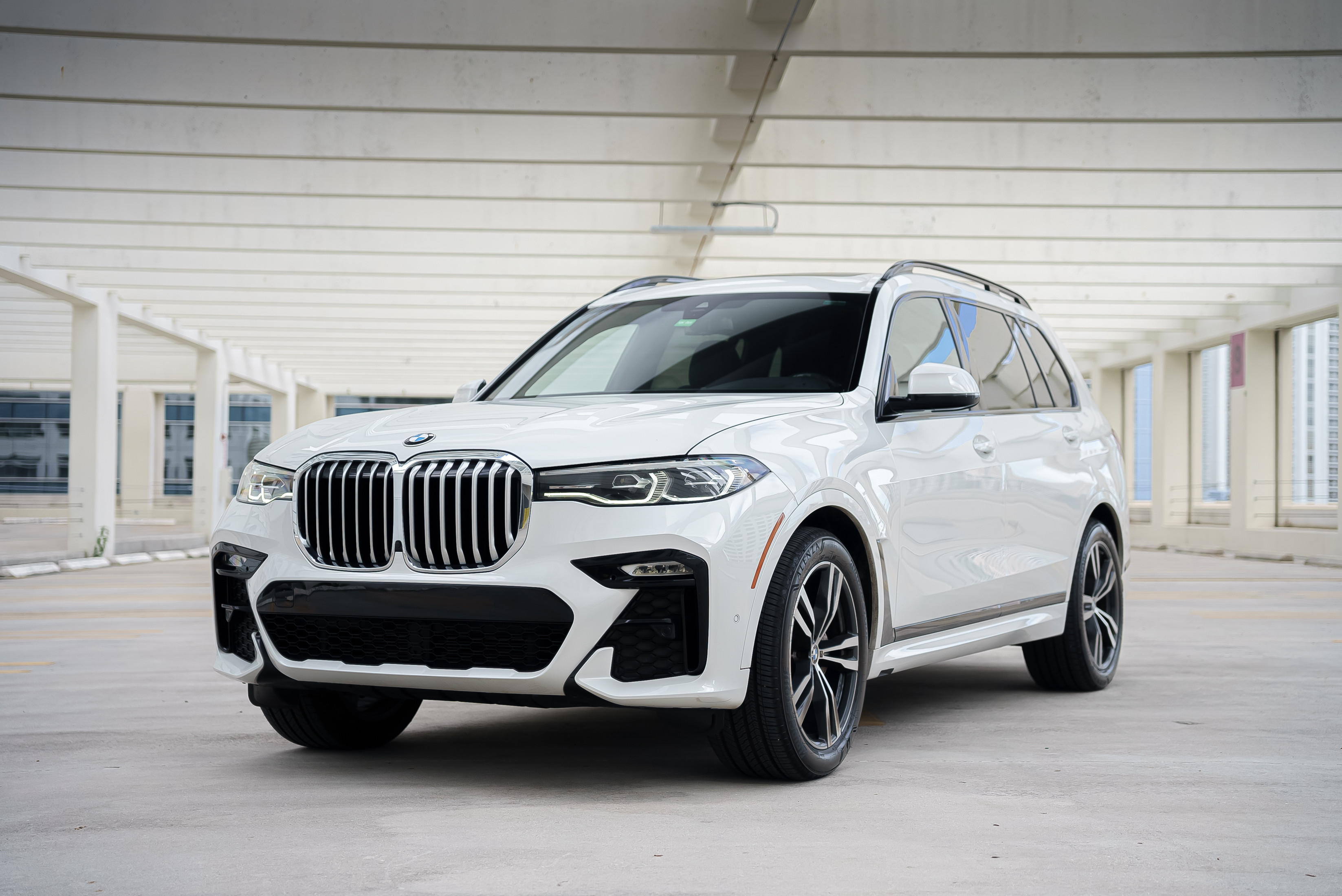 BMW X7 White 2021 for rent in Miami — exterior photo