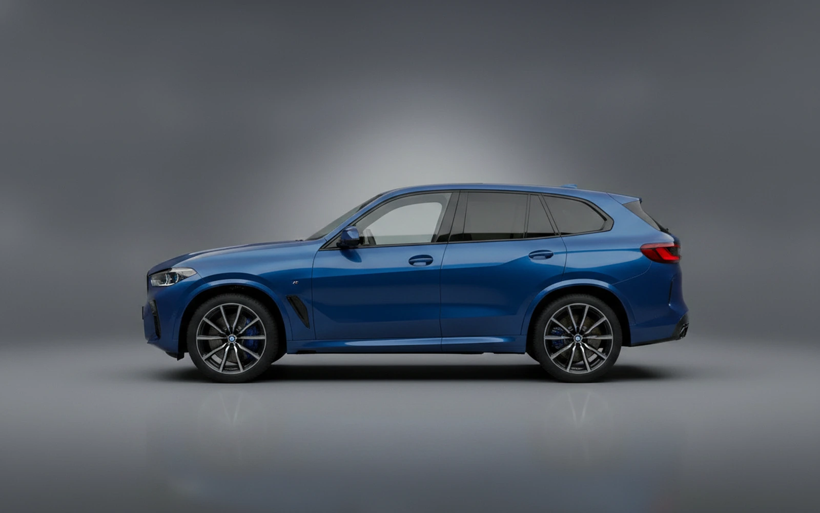 BMW XM Blue 2023 — exterior rear view