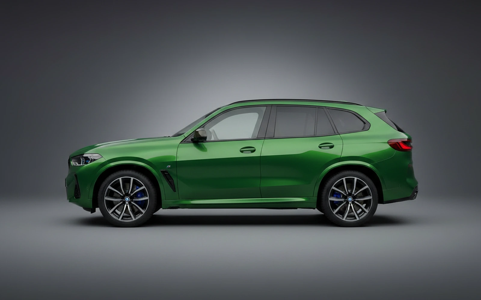 BMW XM Green 2023 — exterior rear view