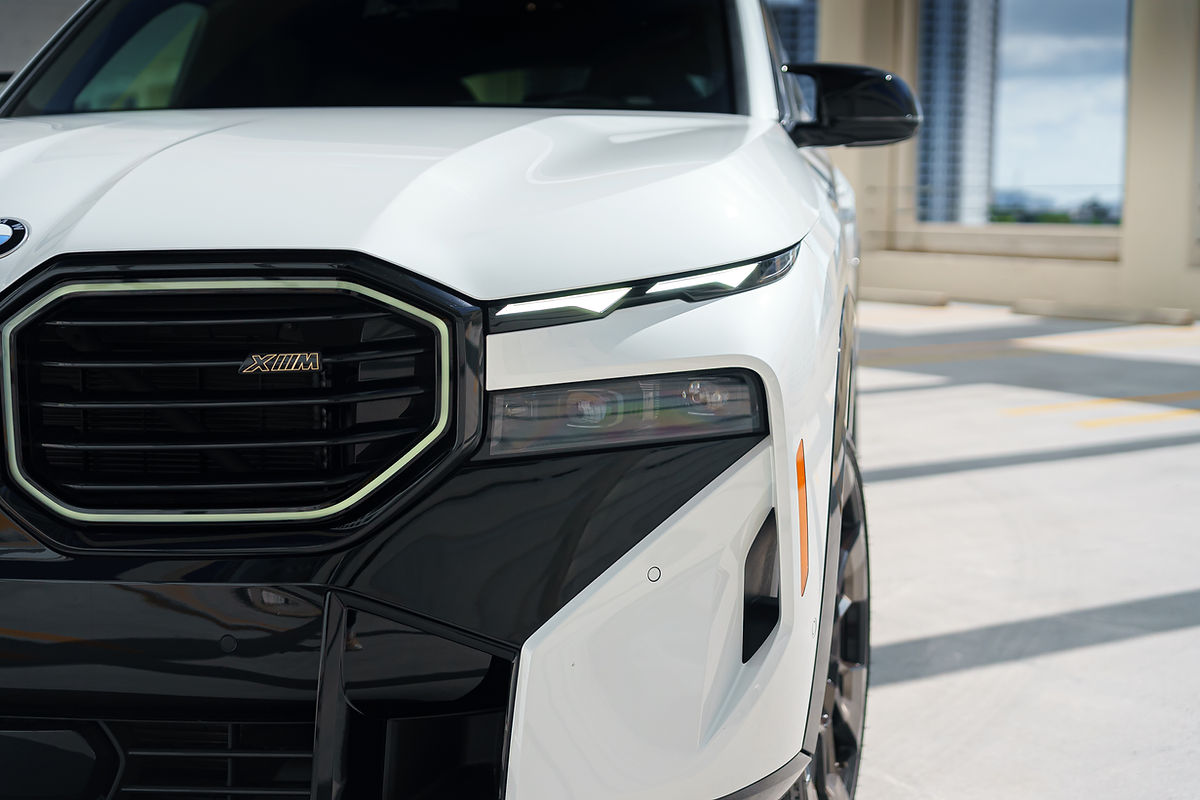 BMW XM White 2023 — exterior side view