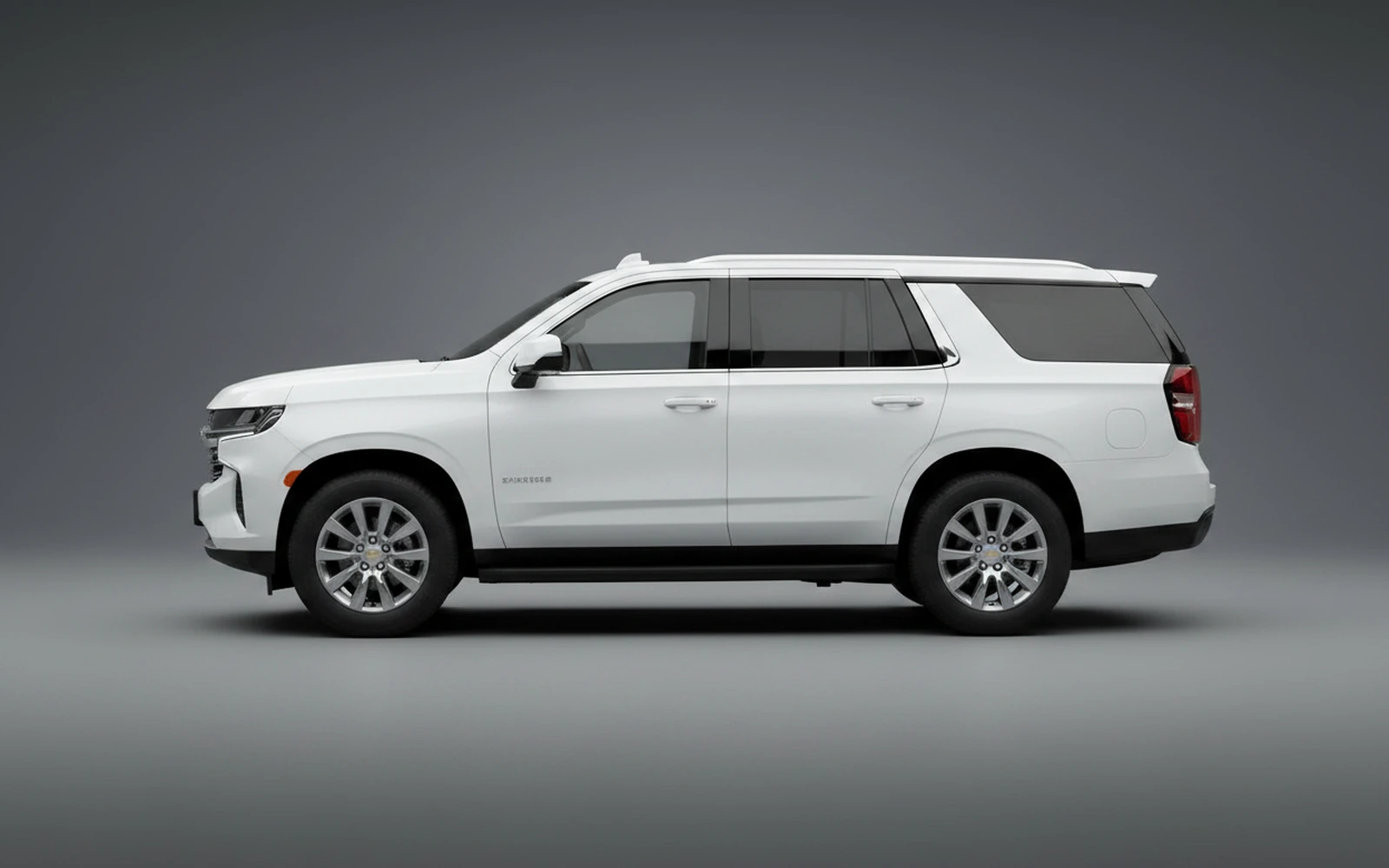 Chevrolet Suburban White 2025 — exterior rear view