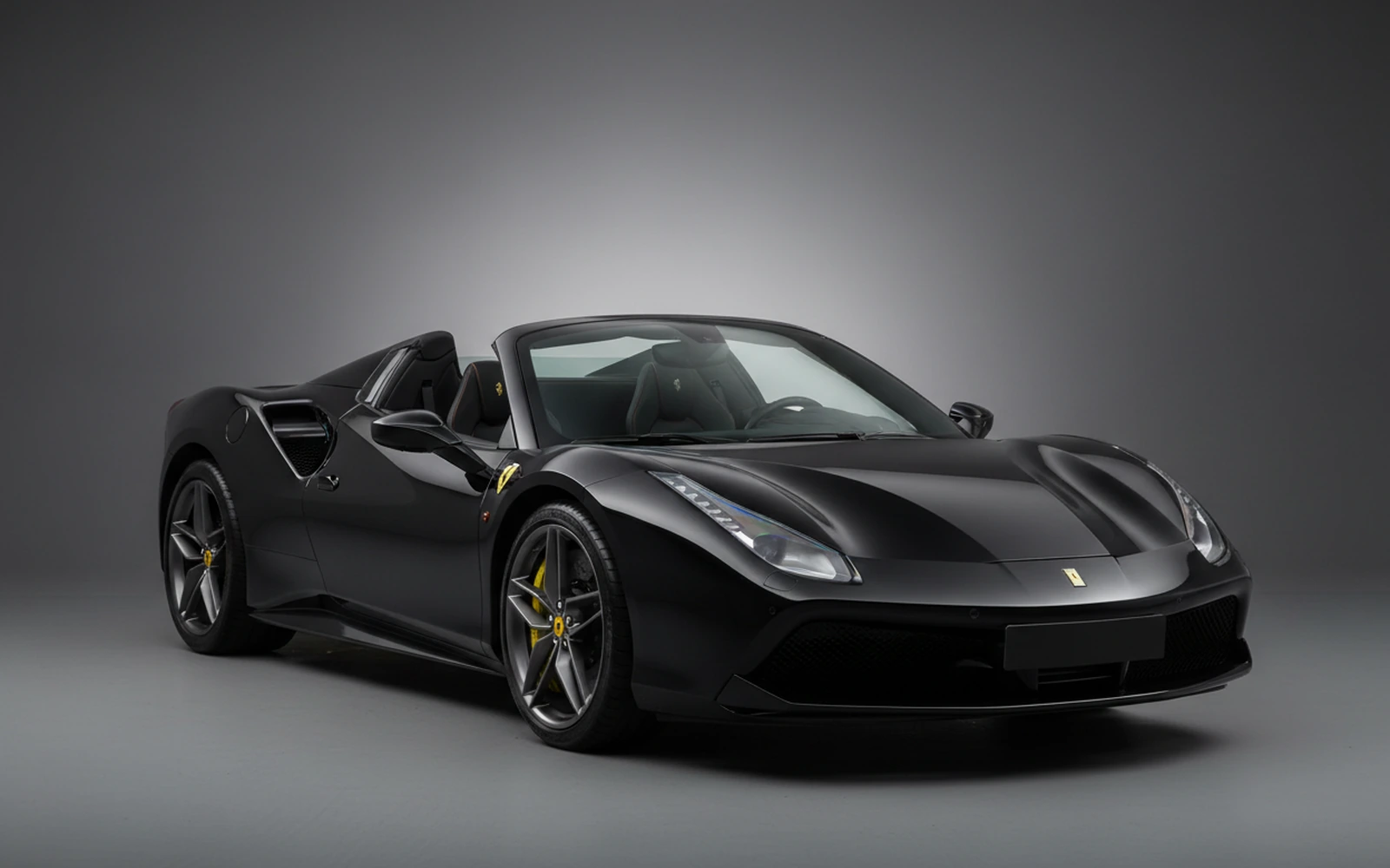 Ferrari 488 Spyder Black 2018 for rent in Miami — exterior front view