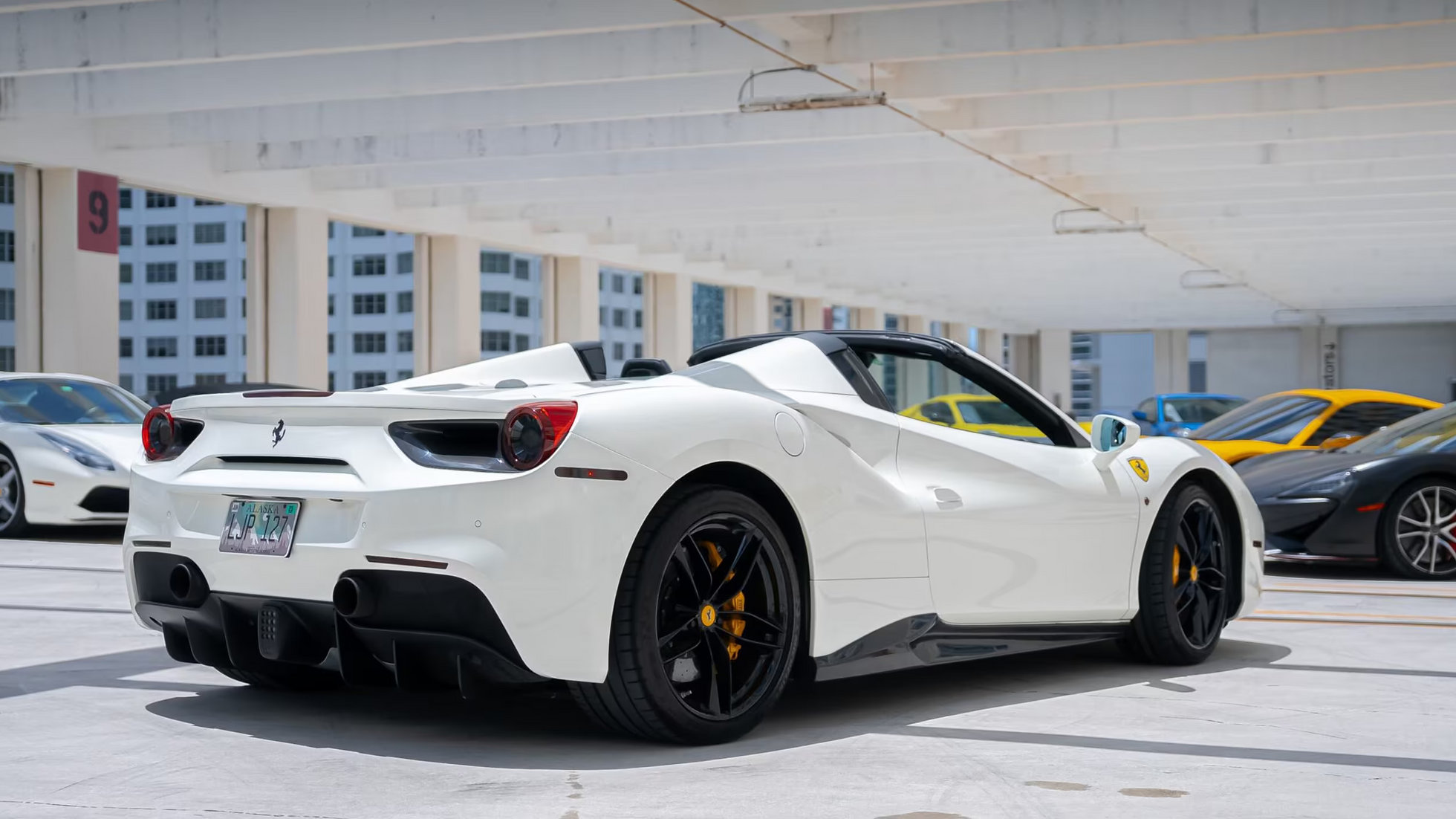 Ferrari 488 Spyder White 2018 — exterior side view