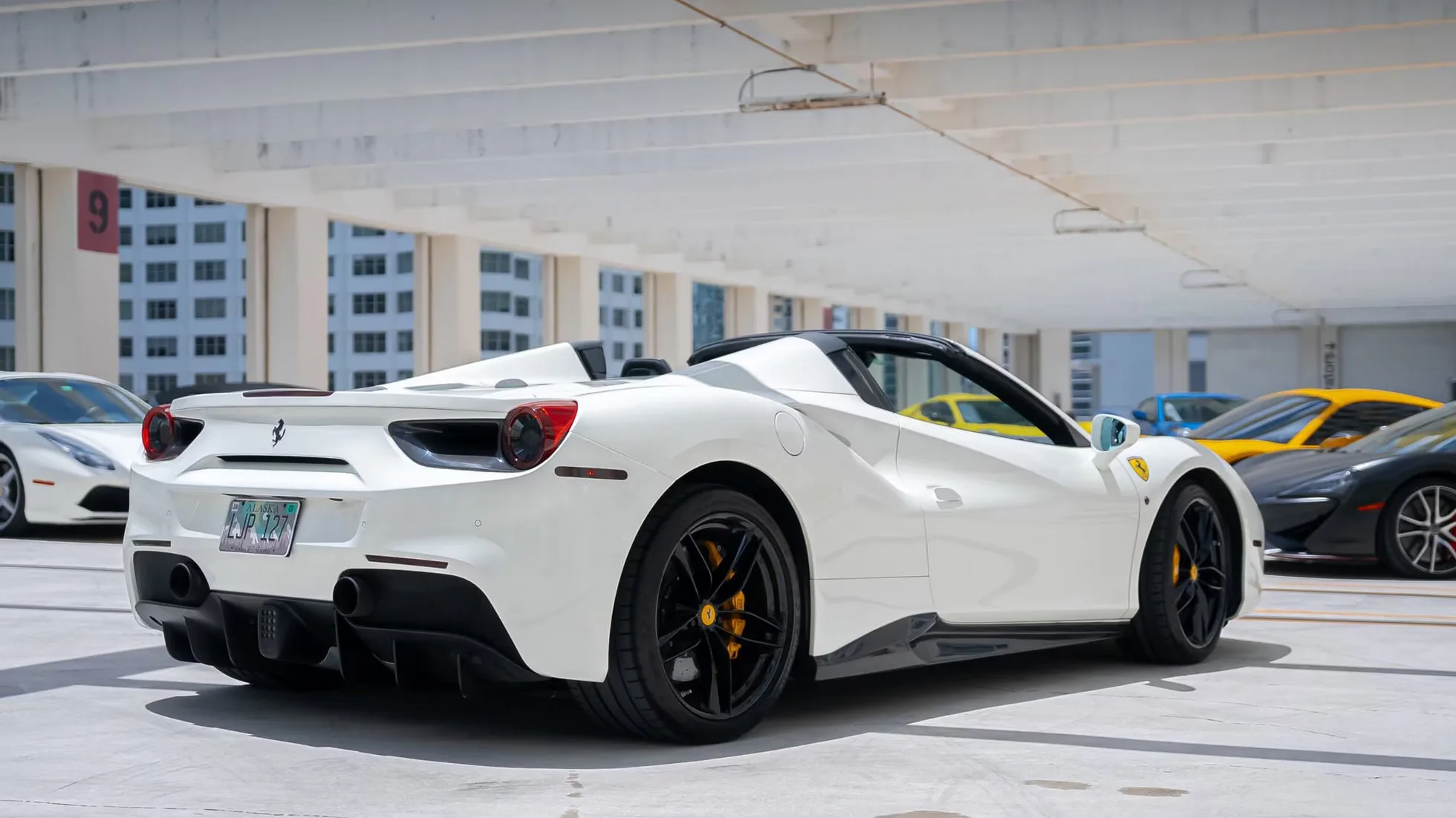 Ferrari 488 Spyder White 2018 — exterior side view