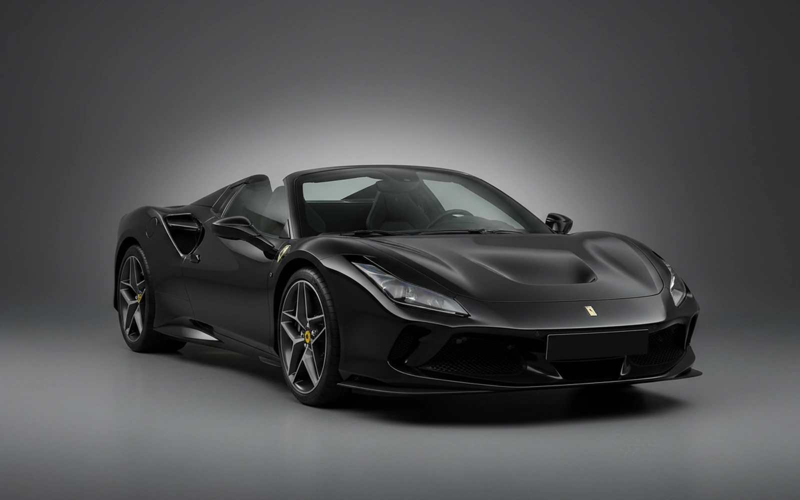 Ferrari F8 Tributo Spider Black 2022 for rent in Miami — exterior front view
