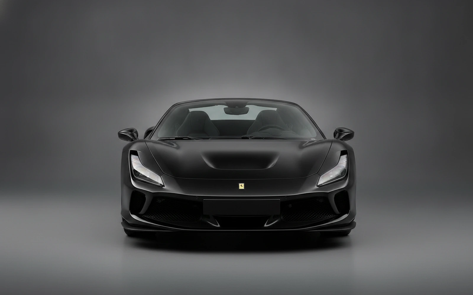Ferrari F8 Tributo Spider Black 2022 — exterior side view