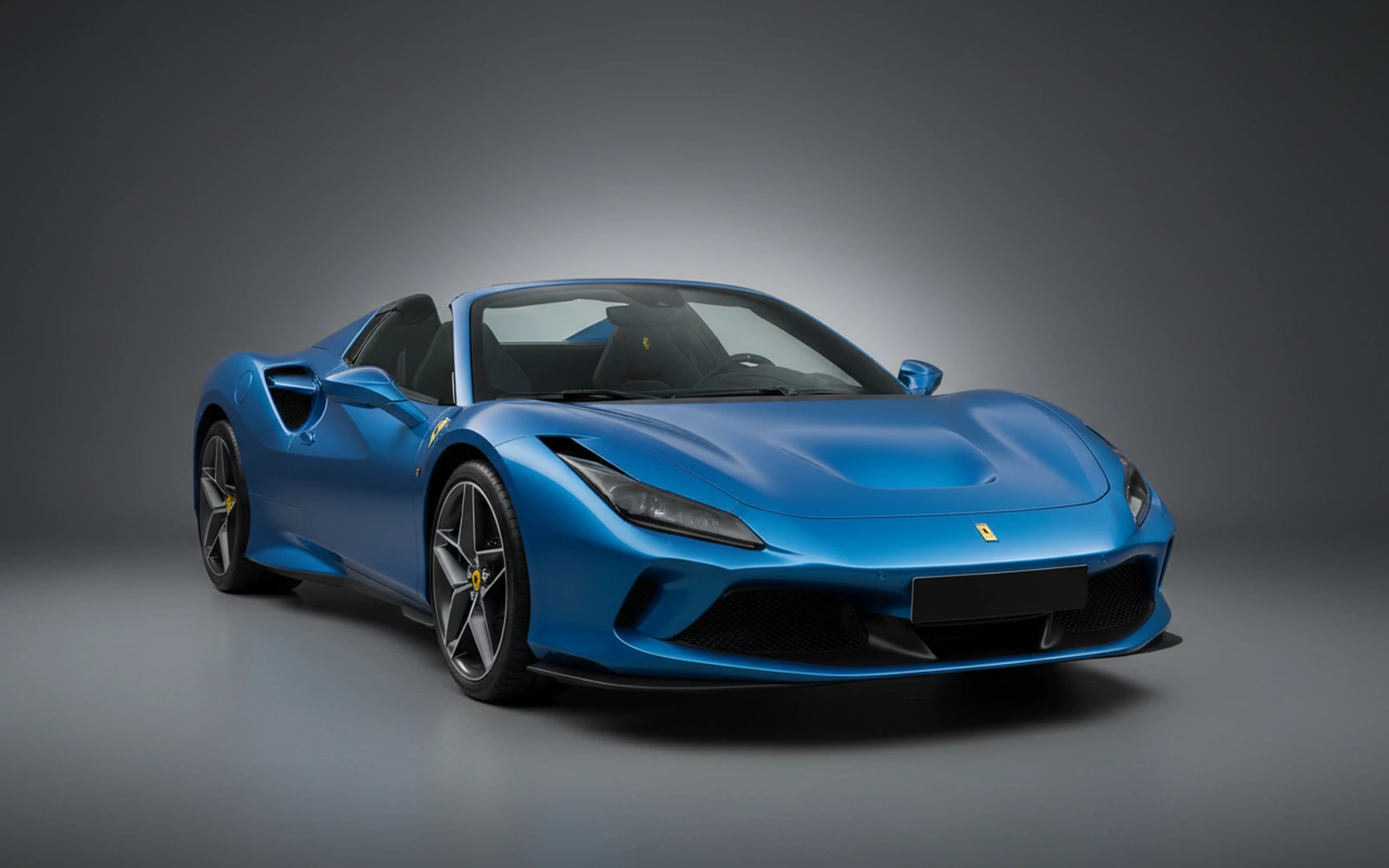 Ferrari F8 Tributo Spider Azul 2022 for rent in Miami — exterior front view