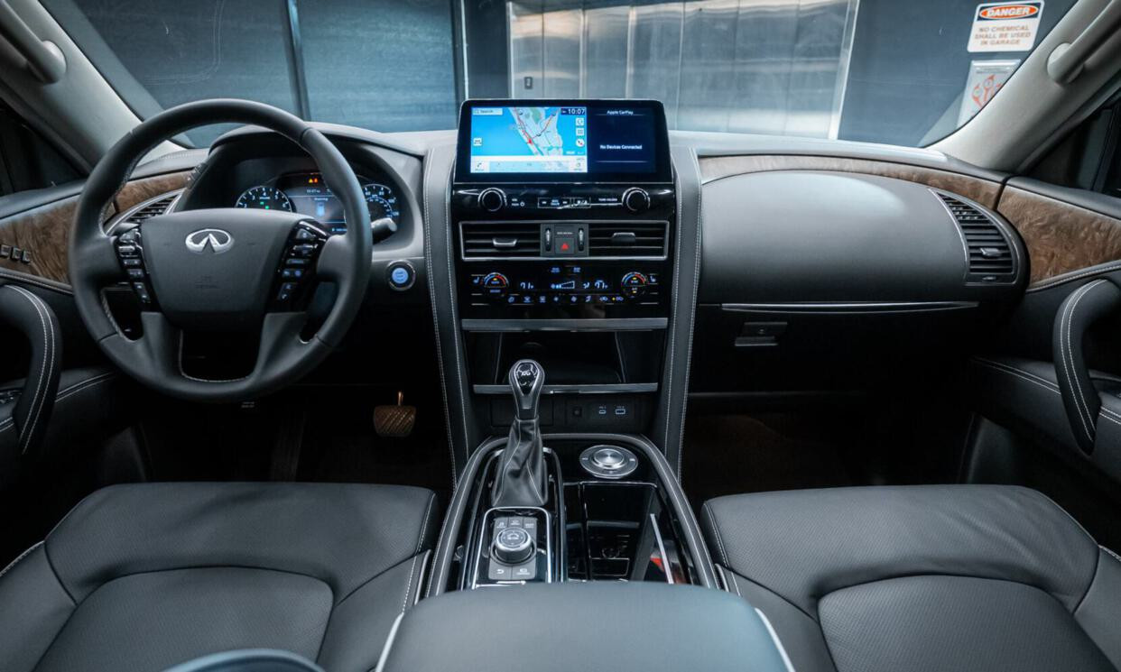 Infiniti QX80 Black 2024 — exterior side view