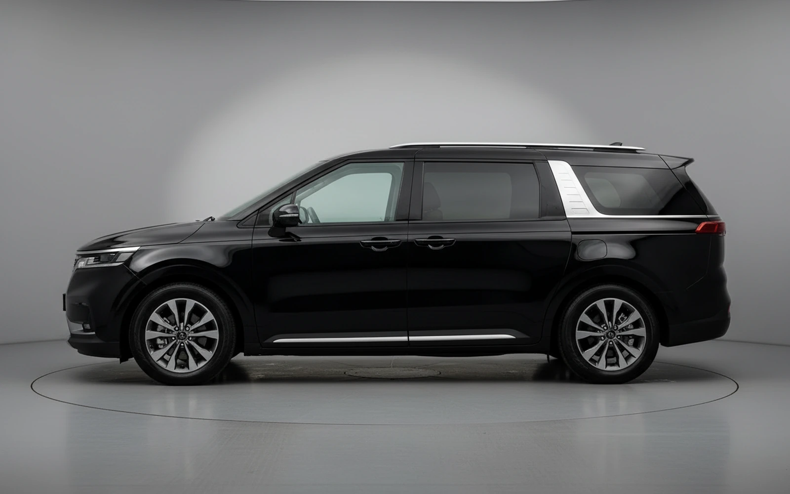 Kia Carnival Grey Blue Negro 2023 — exterior rear view