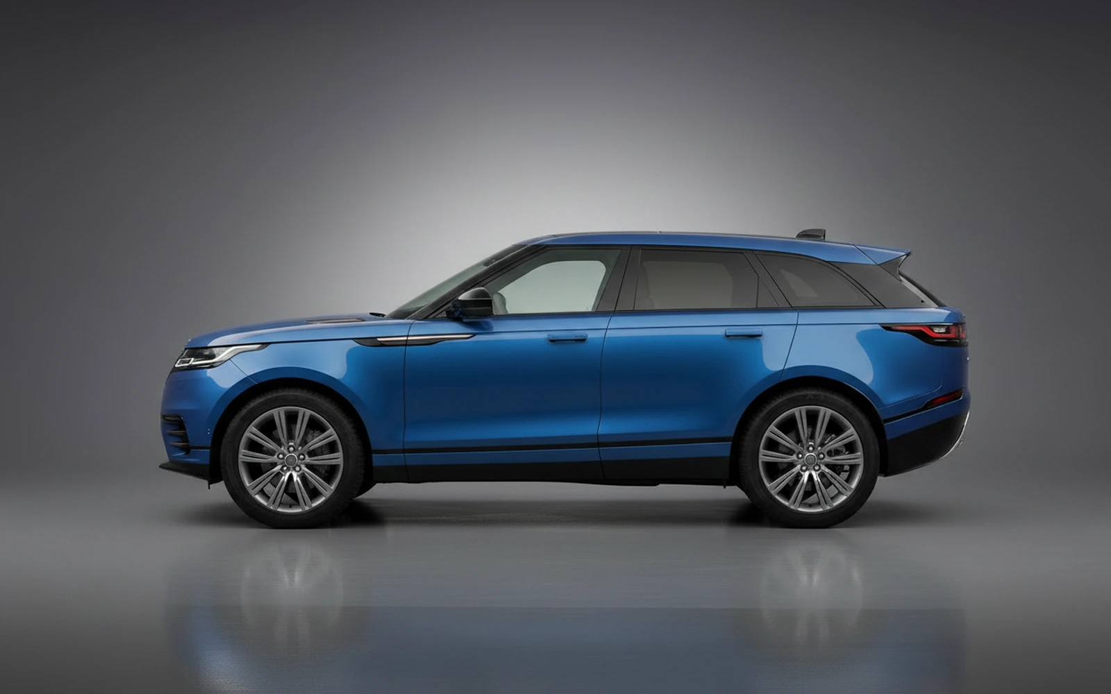 Land Rover Range Rover Velar Blue 2024 — exterior rear view