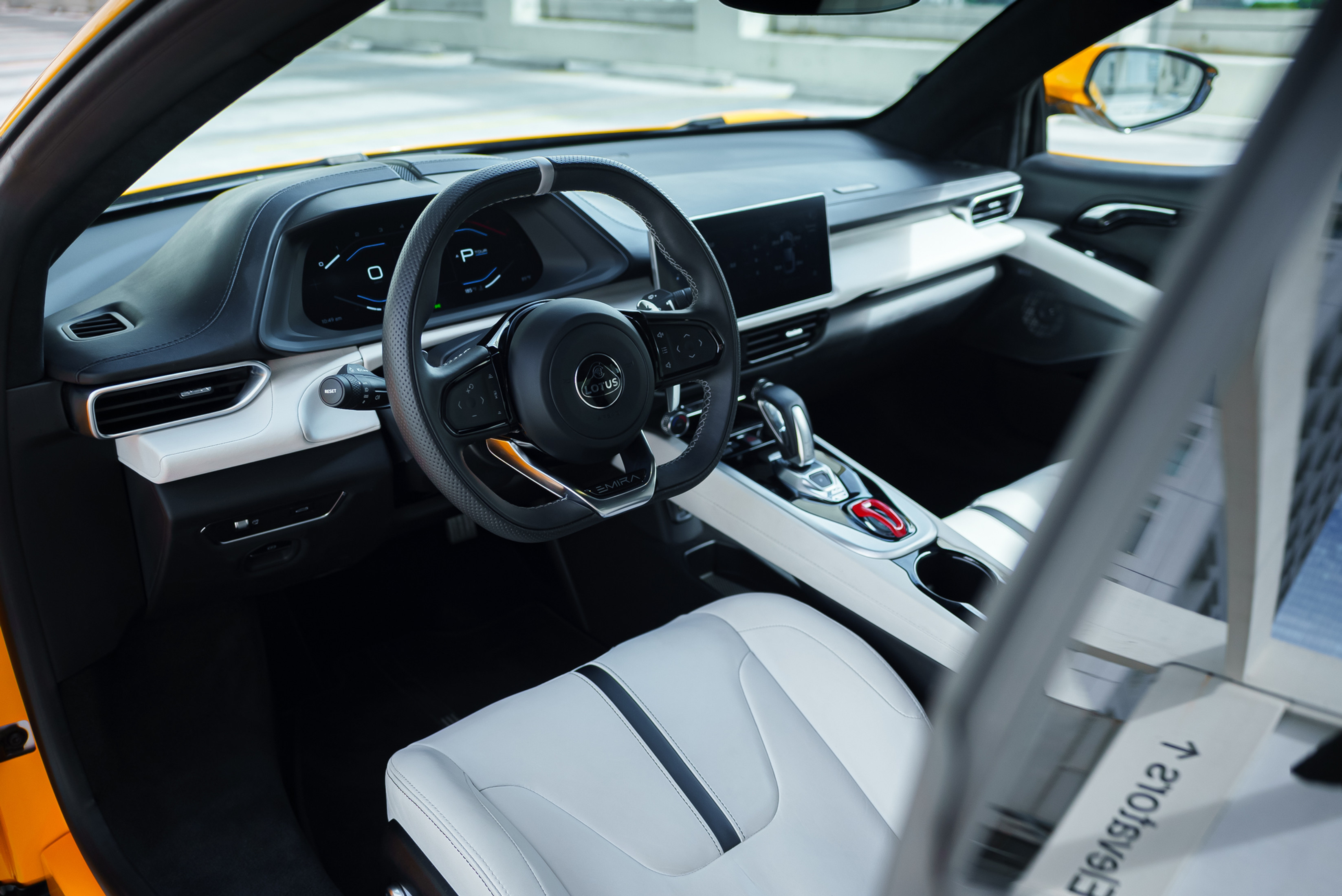Lotus Emira Yellow — interior dashboard