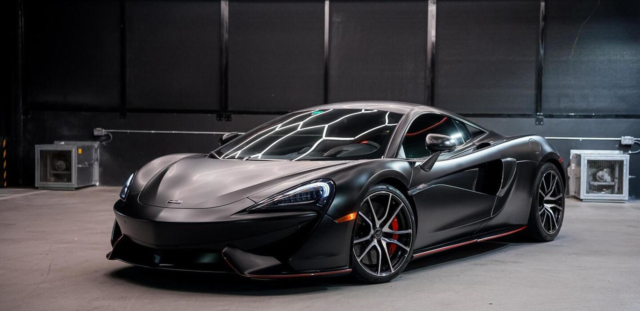 McLaren 570S Silver 2016 — exterior rear view