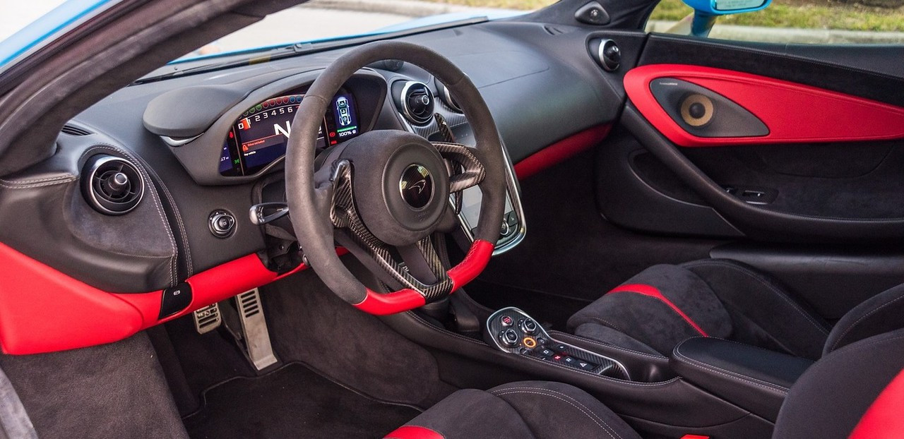 McLaren 570S Silver 2016 — exterior side view