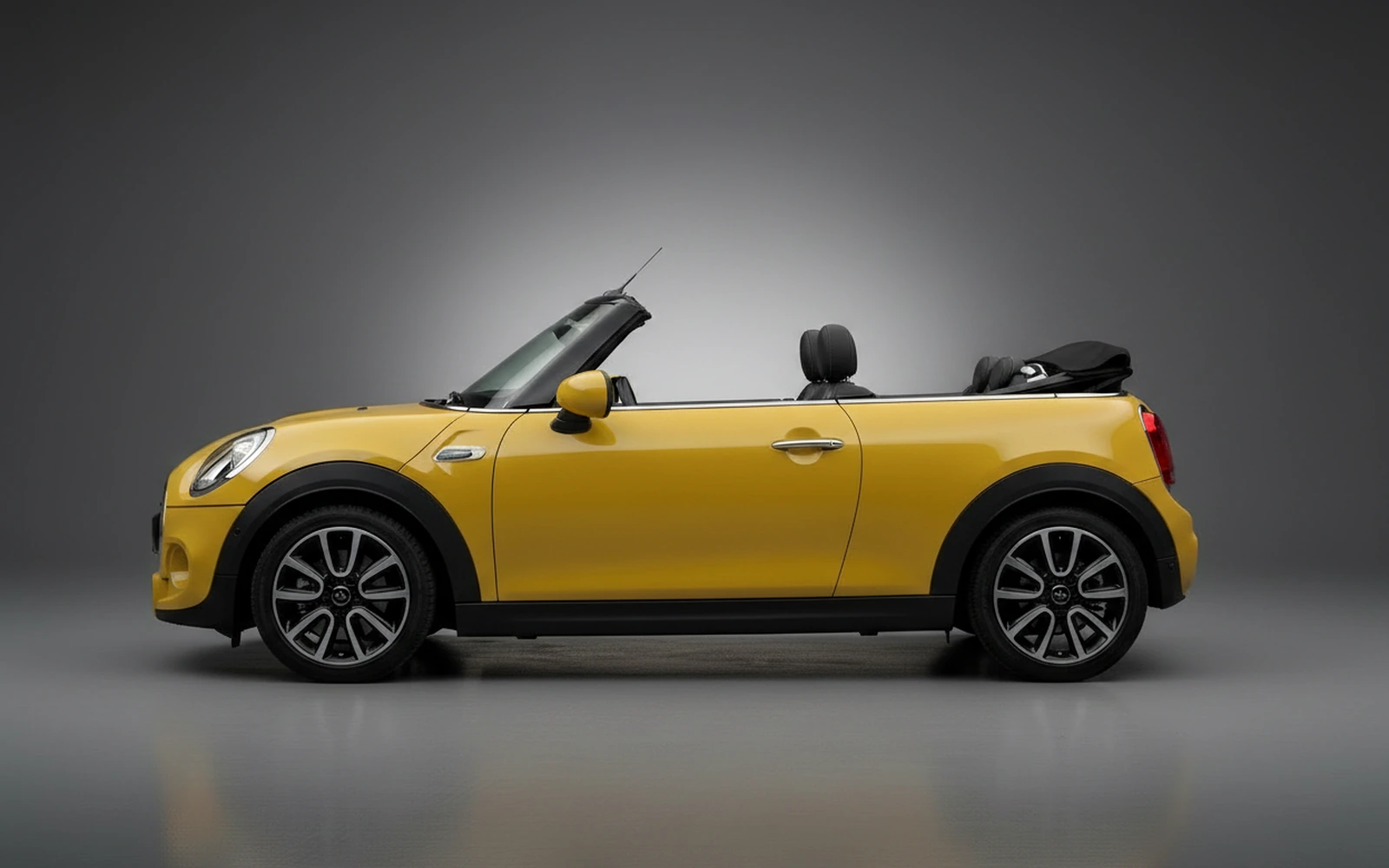 Mini Cooper Convertible Yellow 2023 — exterior rear view