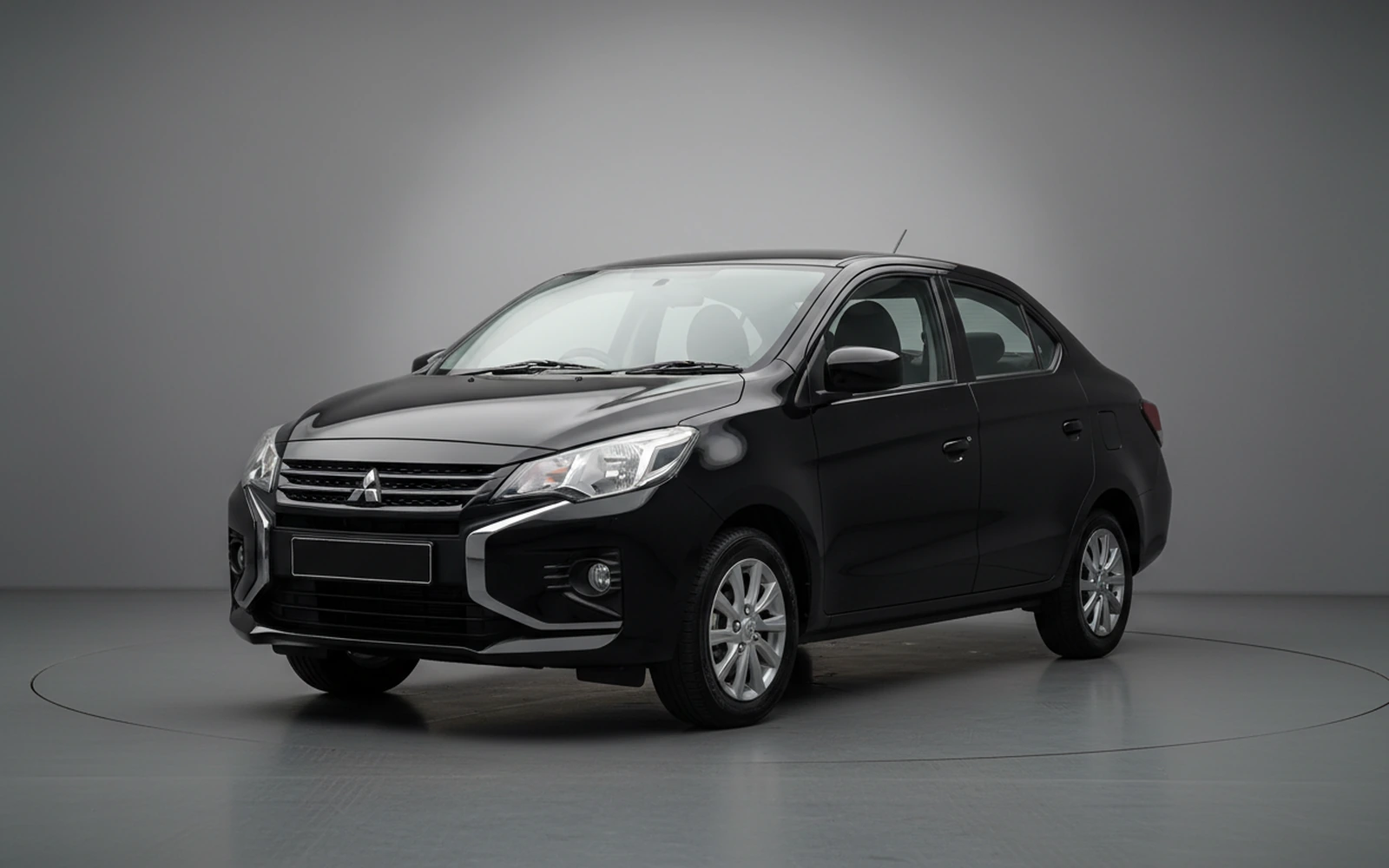 Mitsubishi Attrage Negro 2026 for rent in Miami — exterior front view