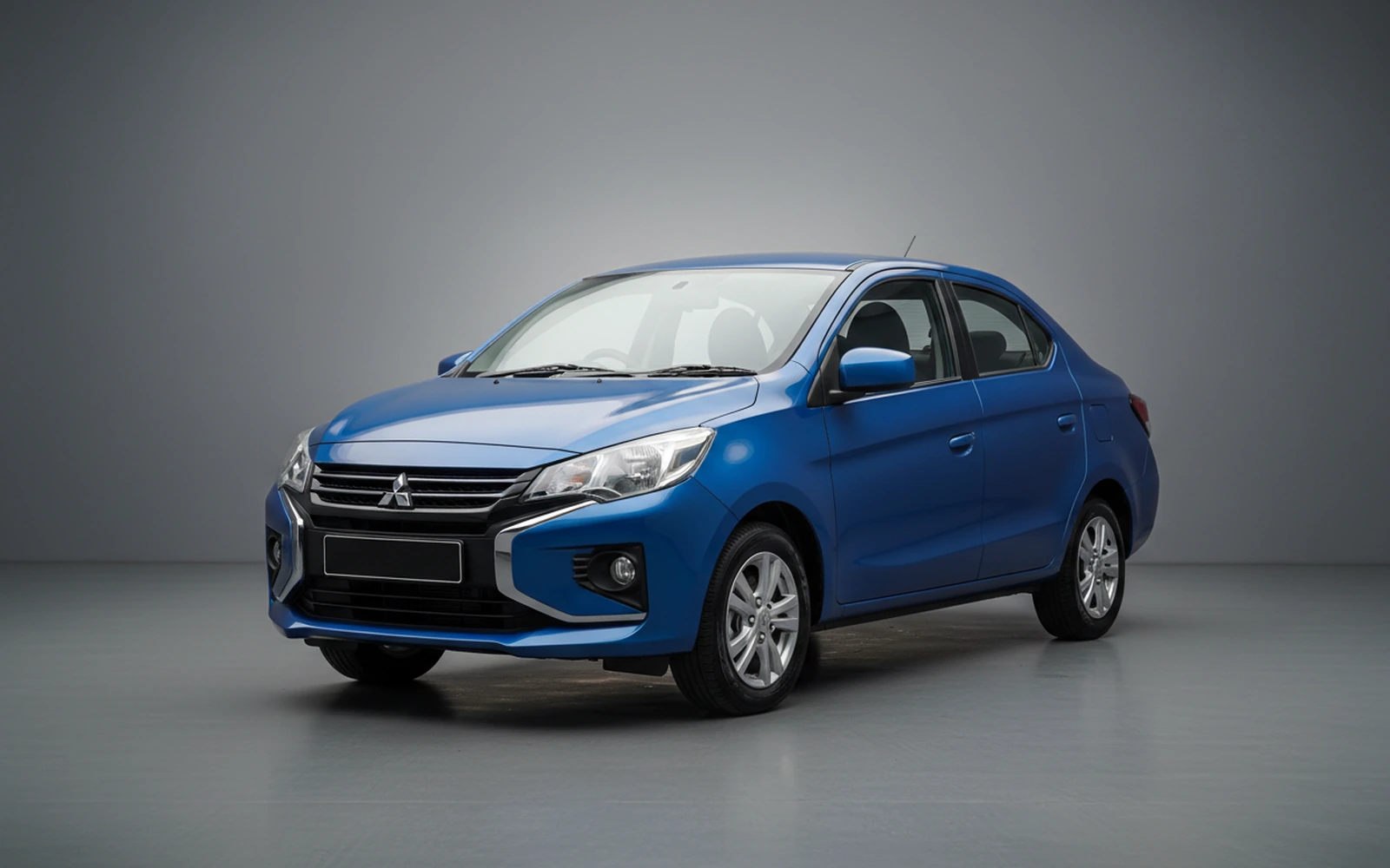 Mitsubishi Attrage Blue 2026 for rent in Miami — exterior front view