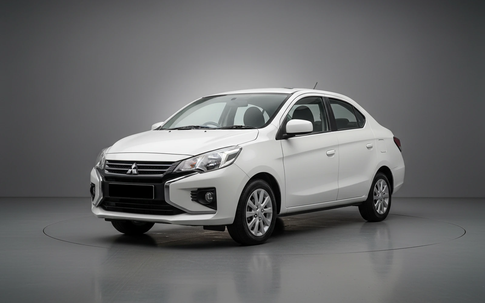 Mitsubishi Attrage White 2026 for rent in Miami — exterior front view