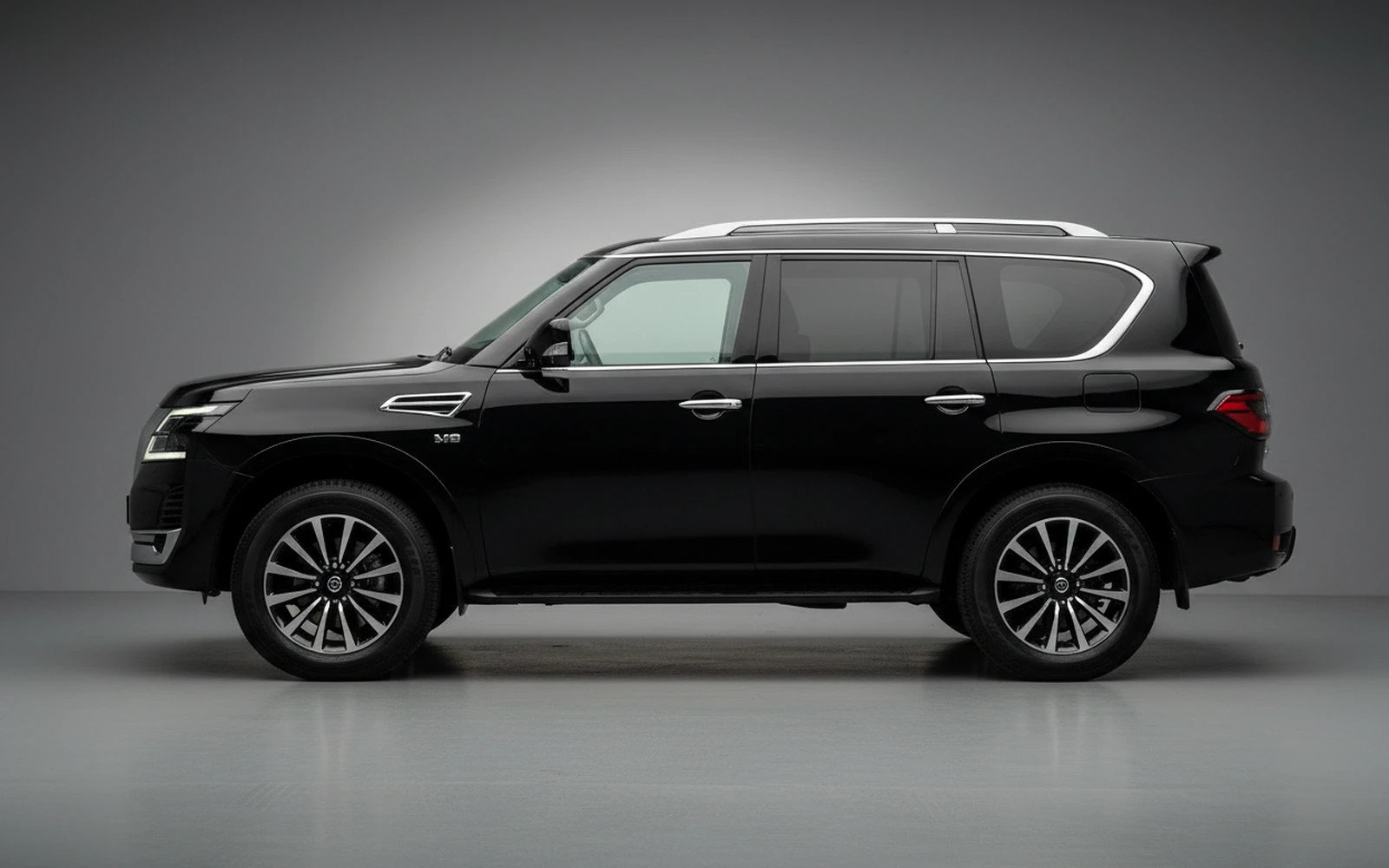 Nissan Patrol Black 2024 — exterior rear view