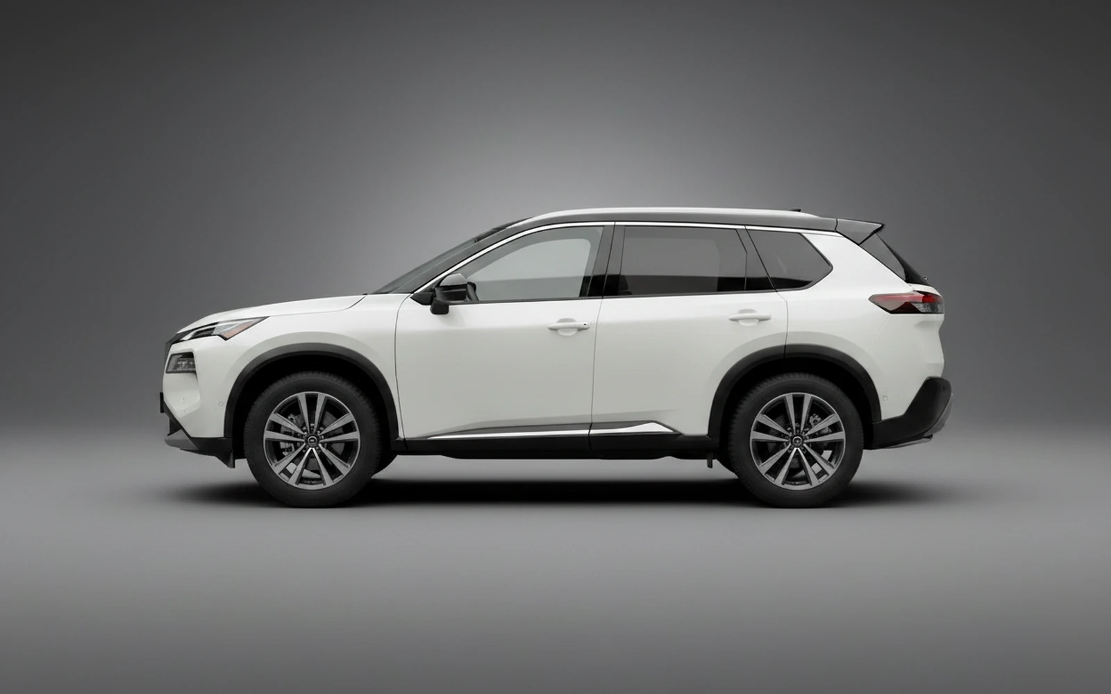 Nissan Rogue White 2025 — exterior rear view