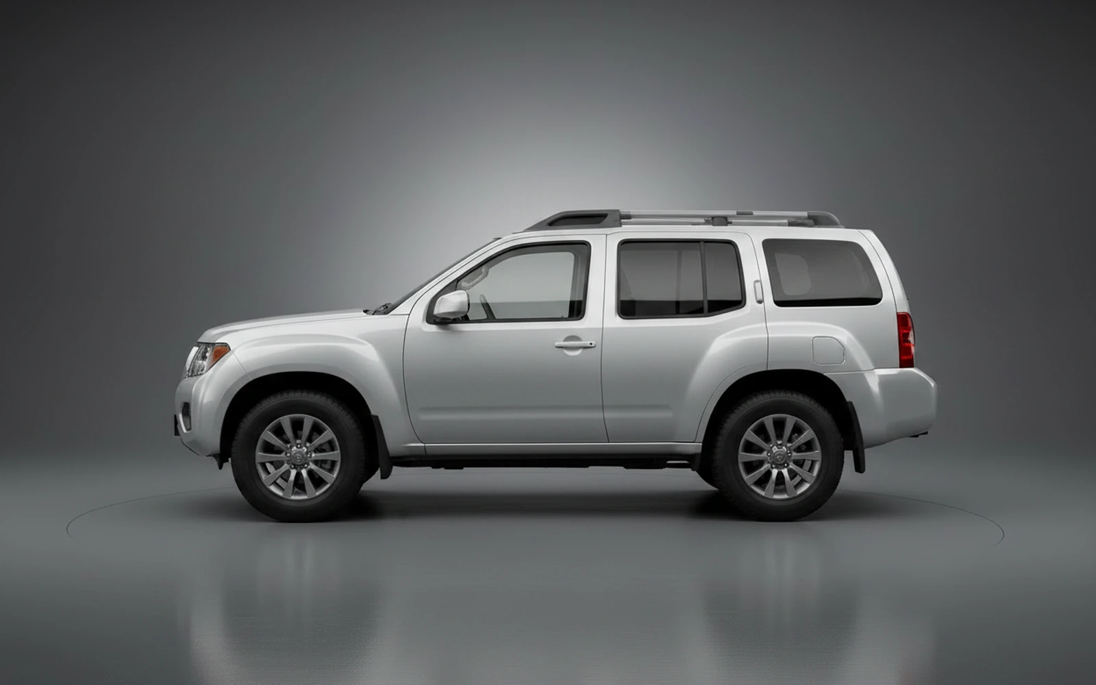 Nissan Xterra Silver 2022 — exterior rear view