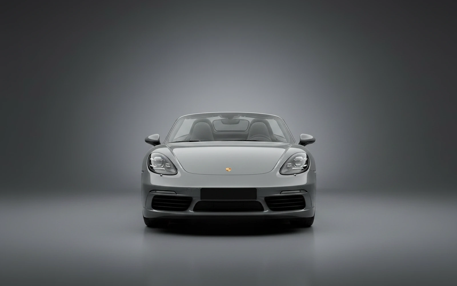 Porsche 718 Boxster Grey 2022 — exterior side view
