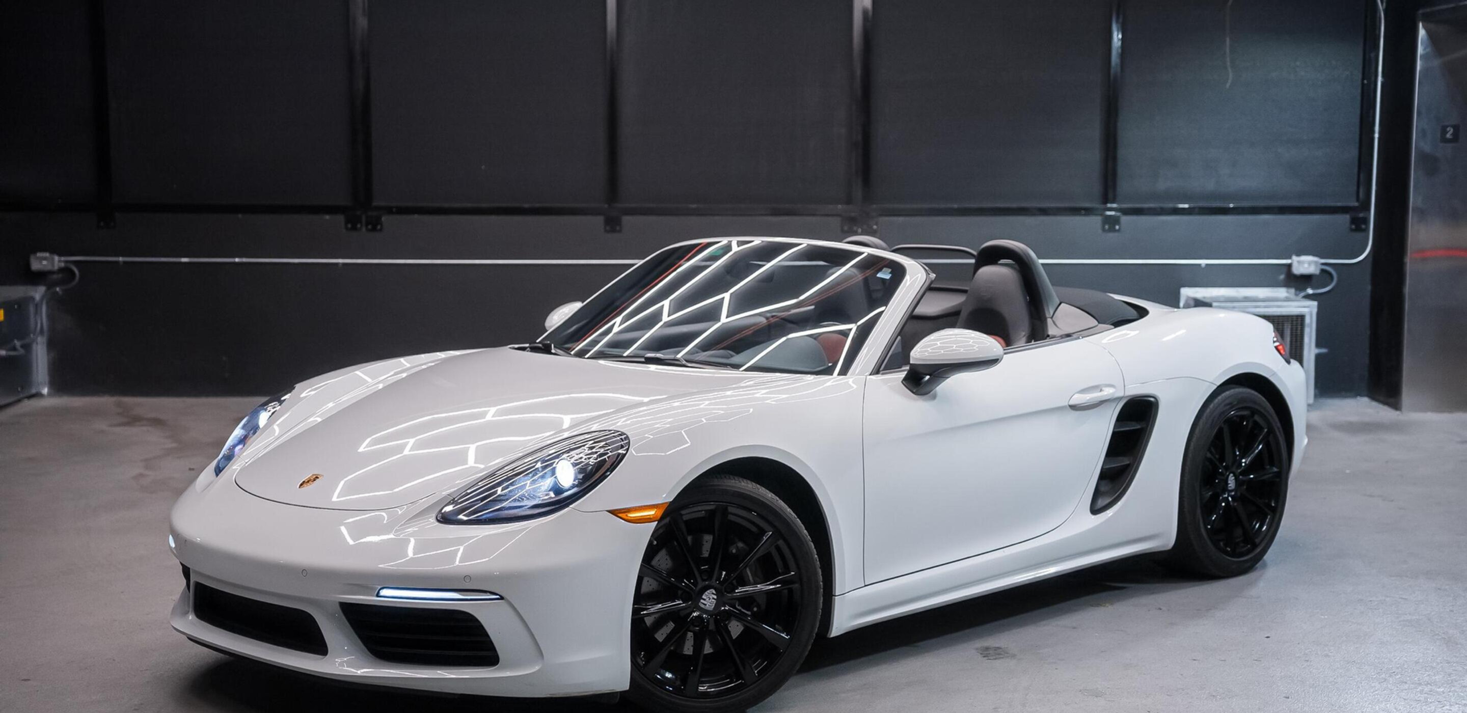 Porsche 718 Boxster Red for rent in Miami — exterior photo