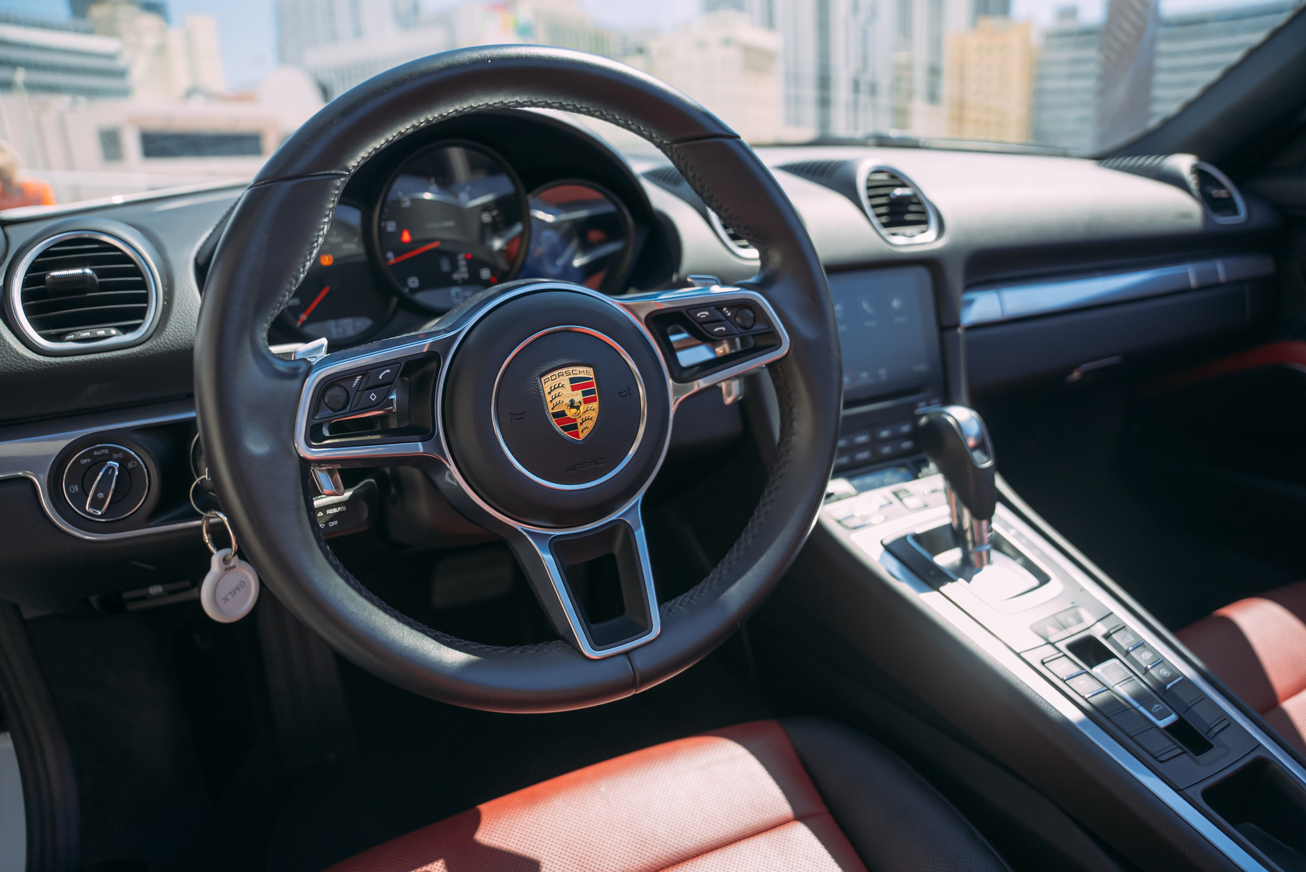 Porsche 718 Boxster Red — exterior side view