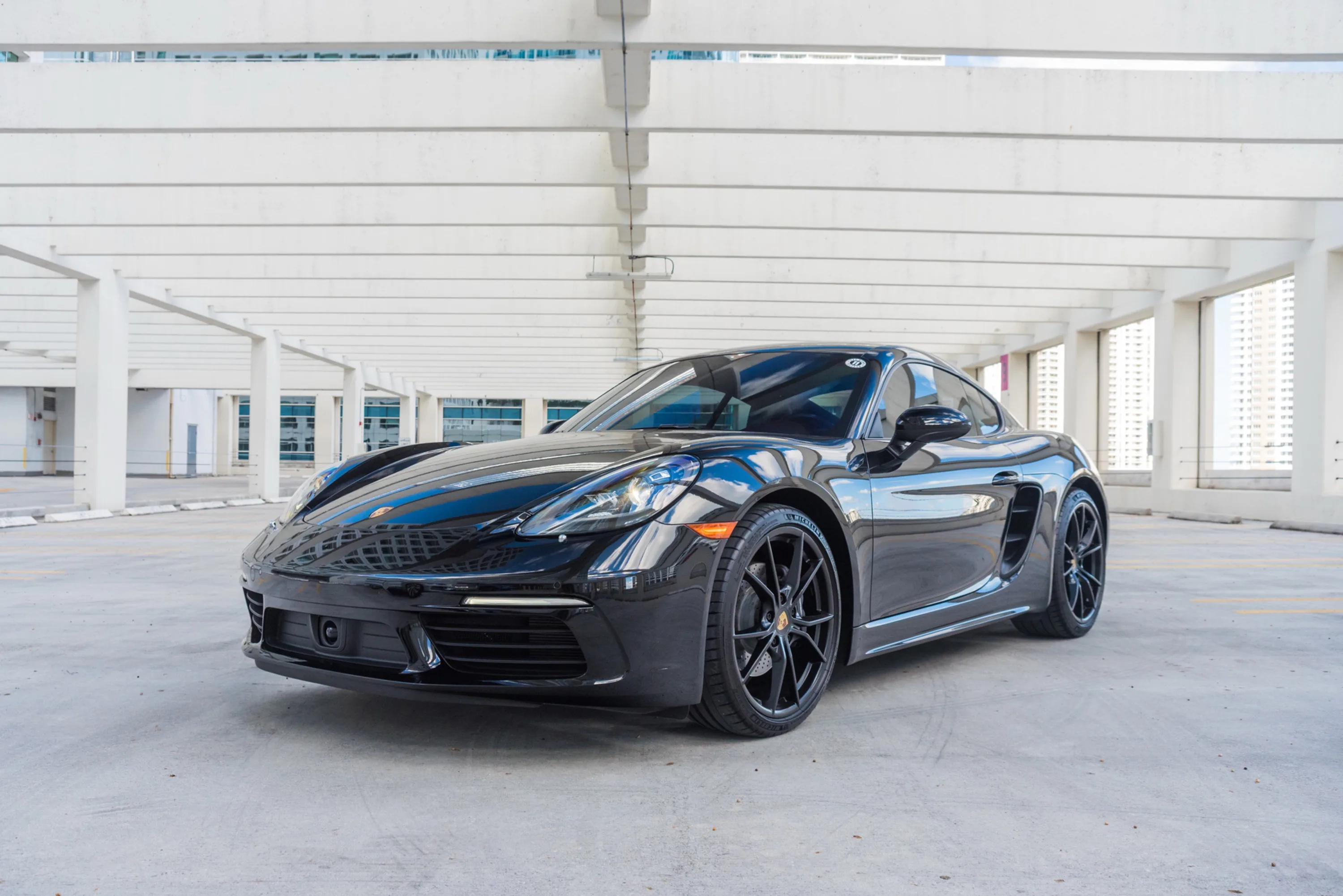 Porsche 718 Cayman White for rent in Miami — exterior photo