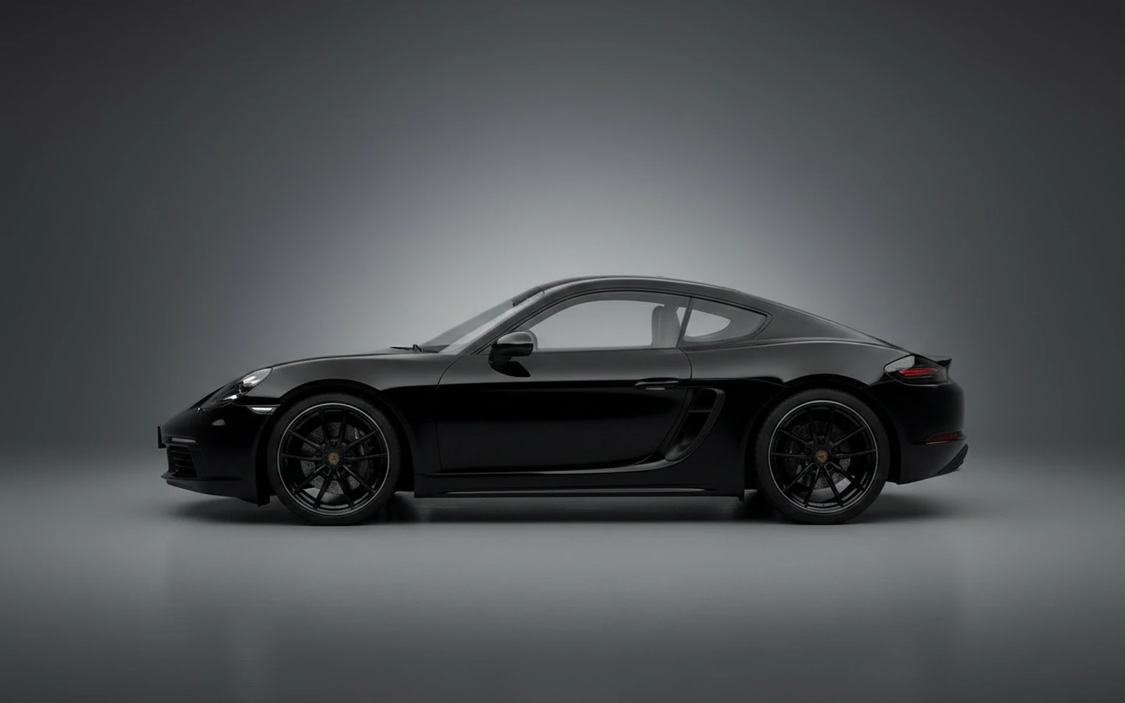 Porsche Cayman Negro 2024 — exterior rear view