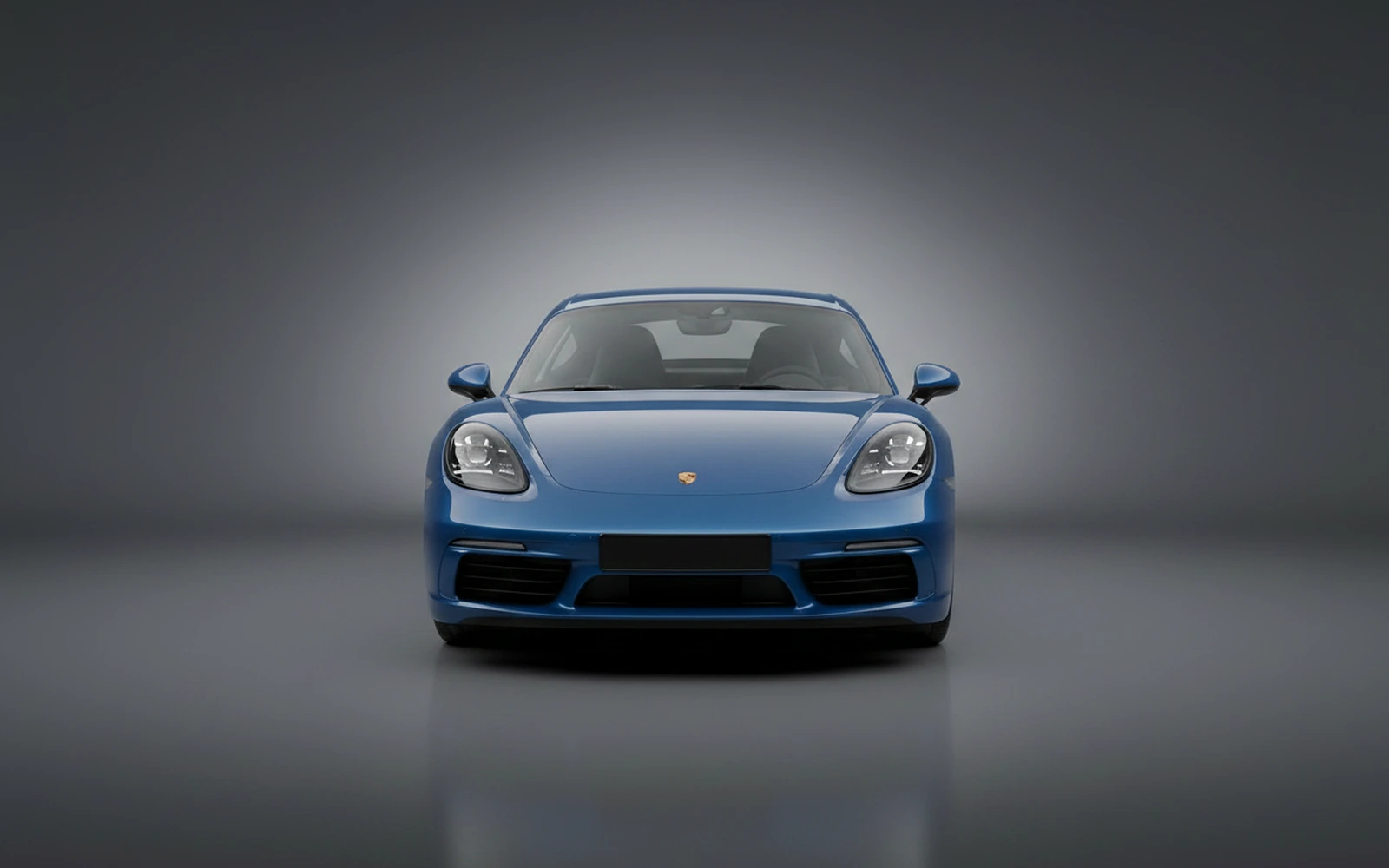 Porsche Cayman Azul 2024 — exterior side view
