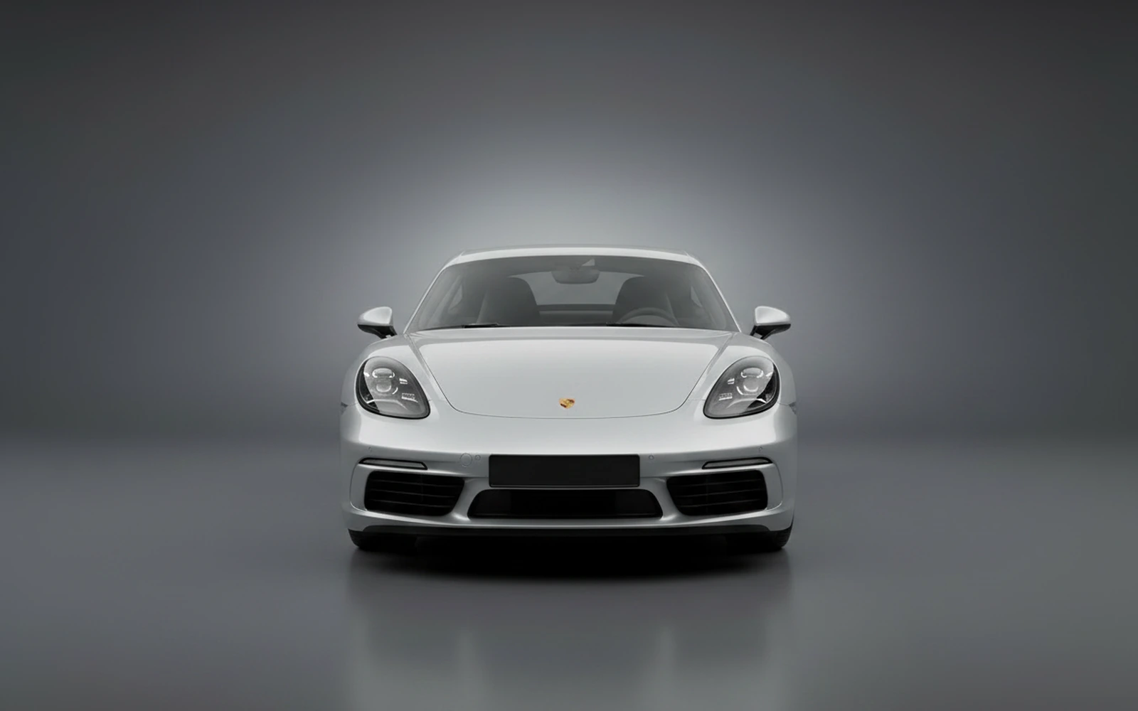 Porsche Cayman Plata 2024 — exterior side view