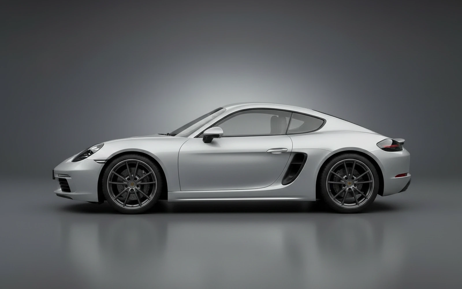 Porsche Cayman Plata 2024 — exterior rear view
