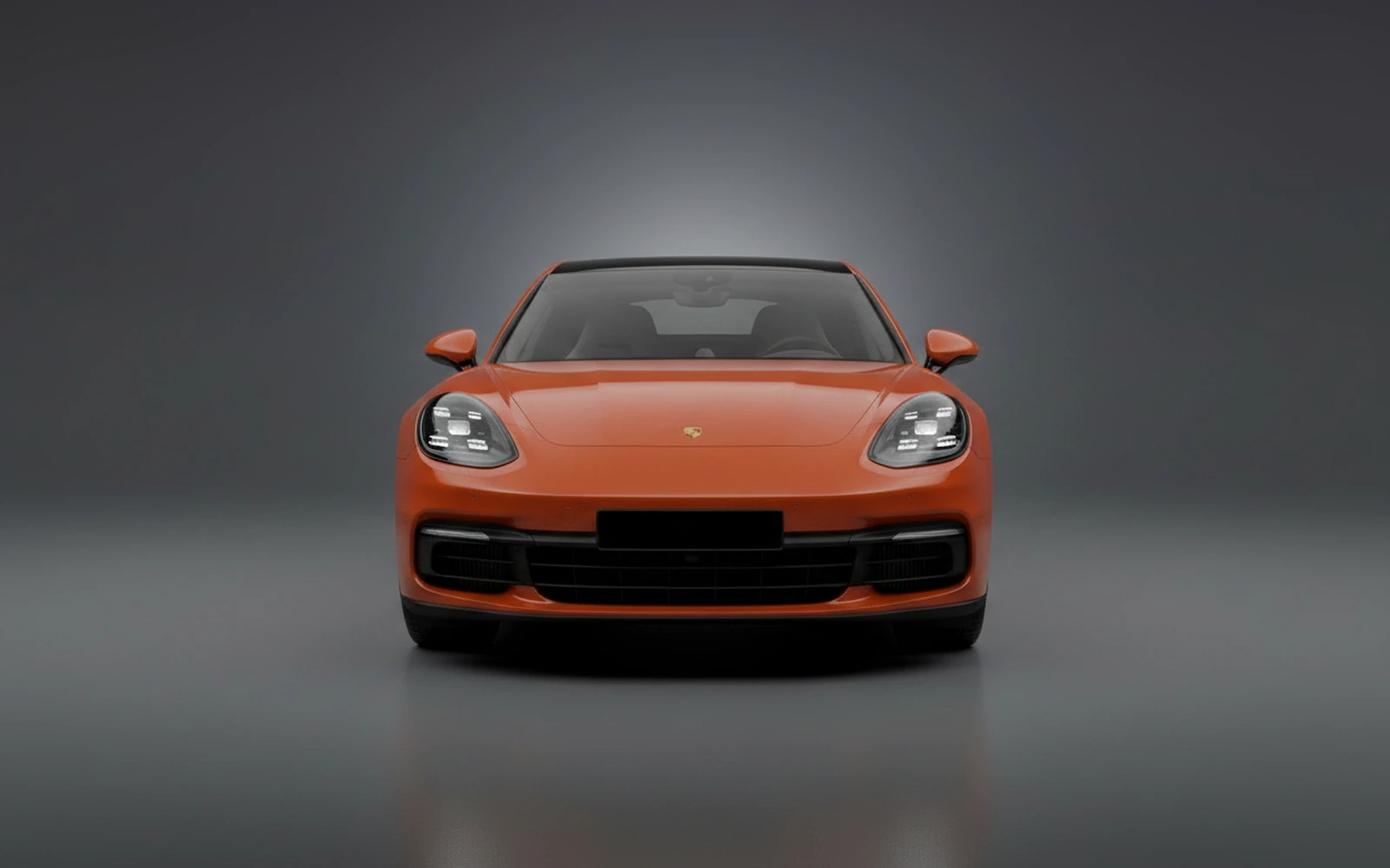 Porsche Panamera 4 Hybrid Orange 2023 — exterior side view