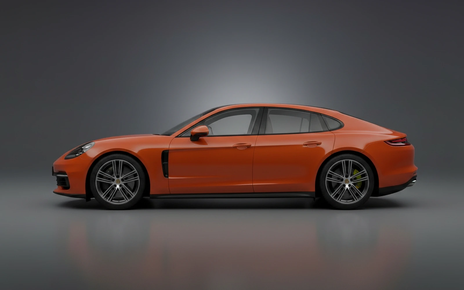 Porsche Panamera 4 Hybrid Orange 2023 — exterior rear view