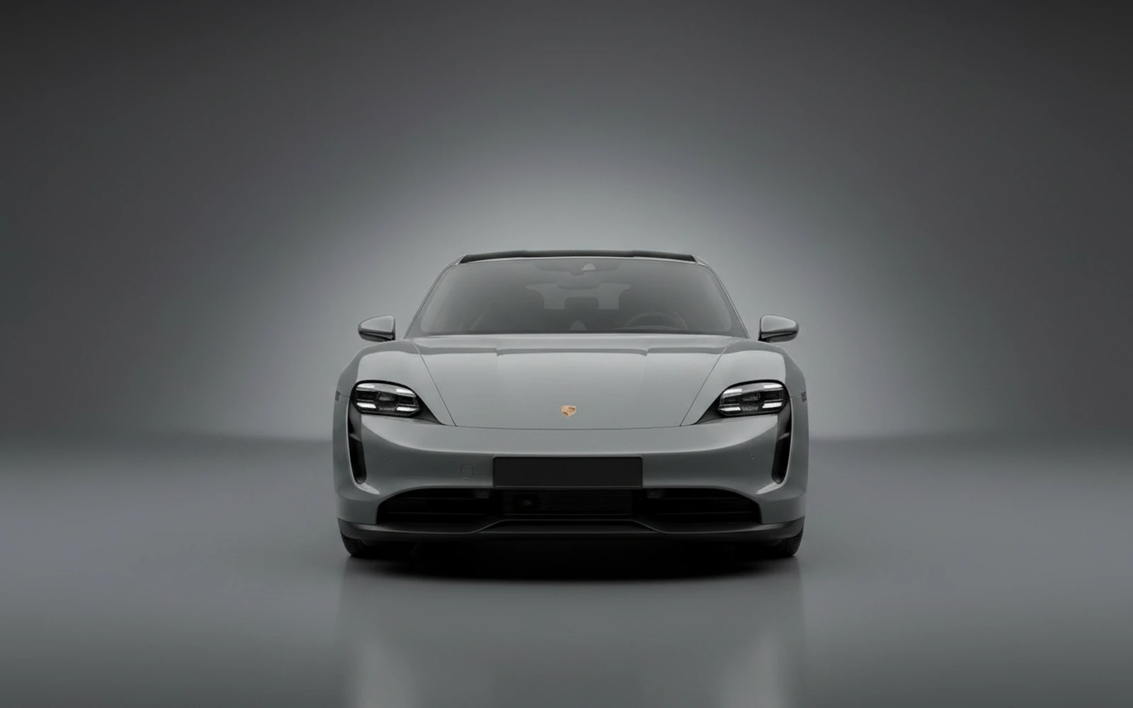 Porsche Taycan Grey 2025 — exterior side view
