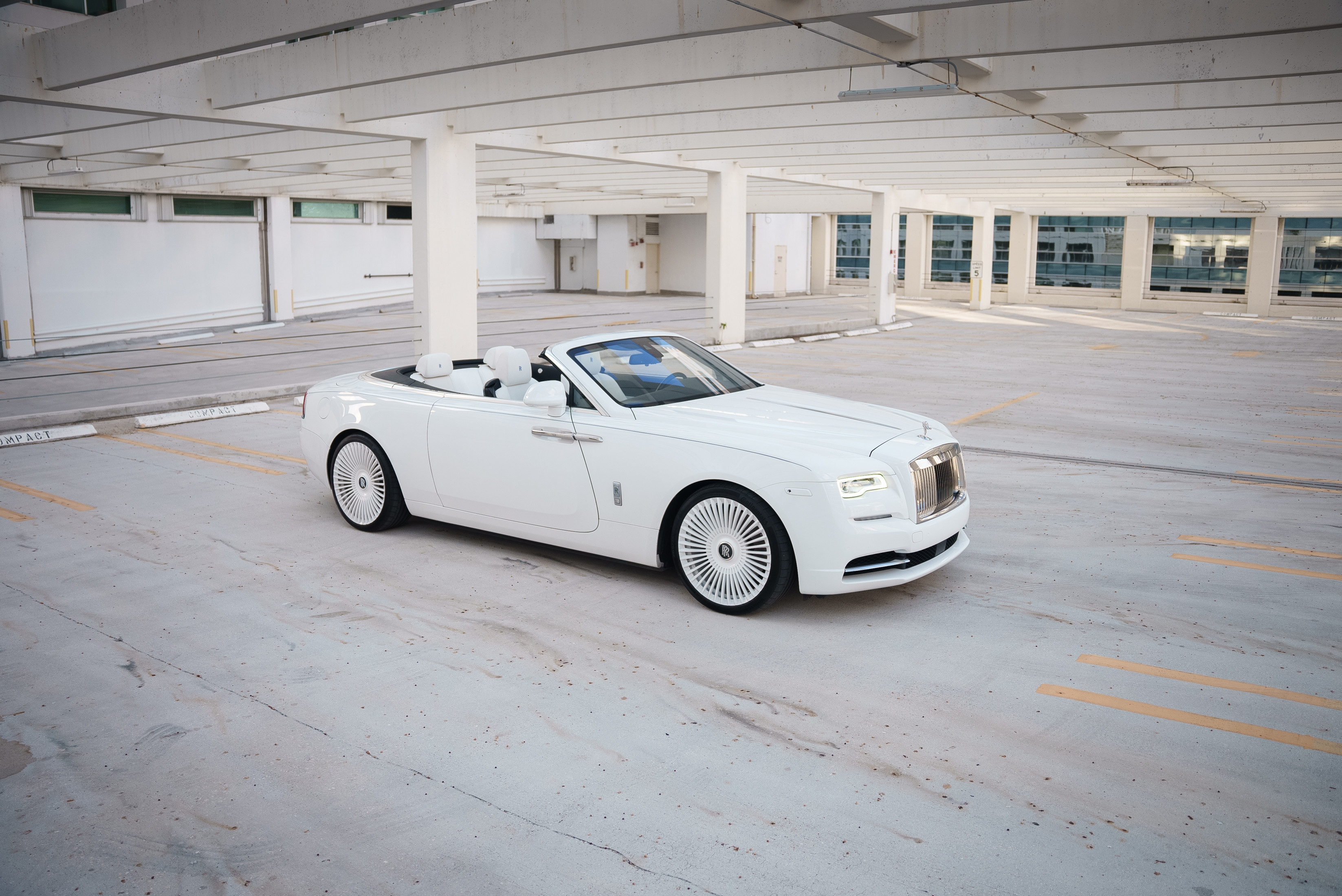 Rolls-Royce Dawn rear view — white convertible luxury rental in Miami