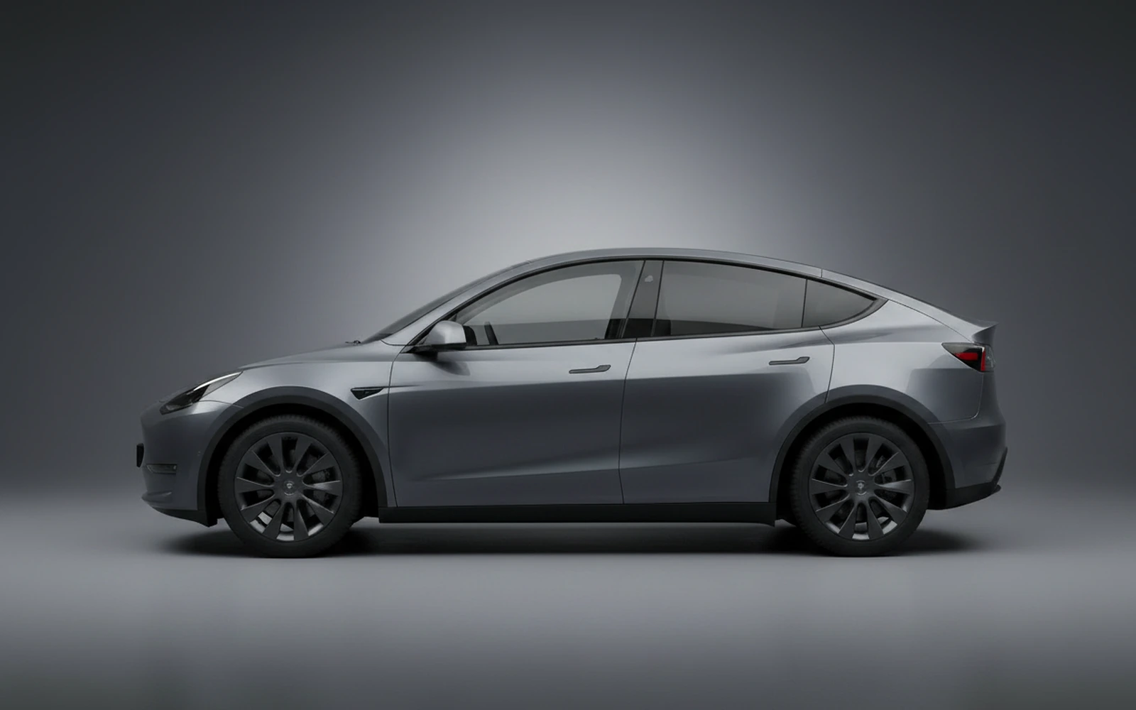 Tesla Model Y Gris 2024 — exterior rear view