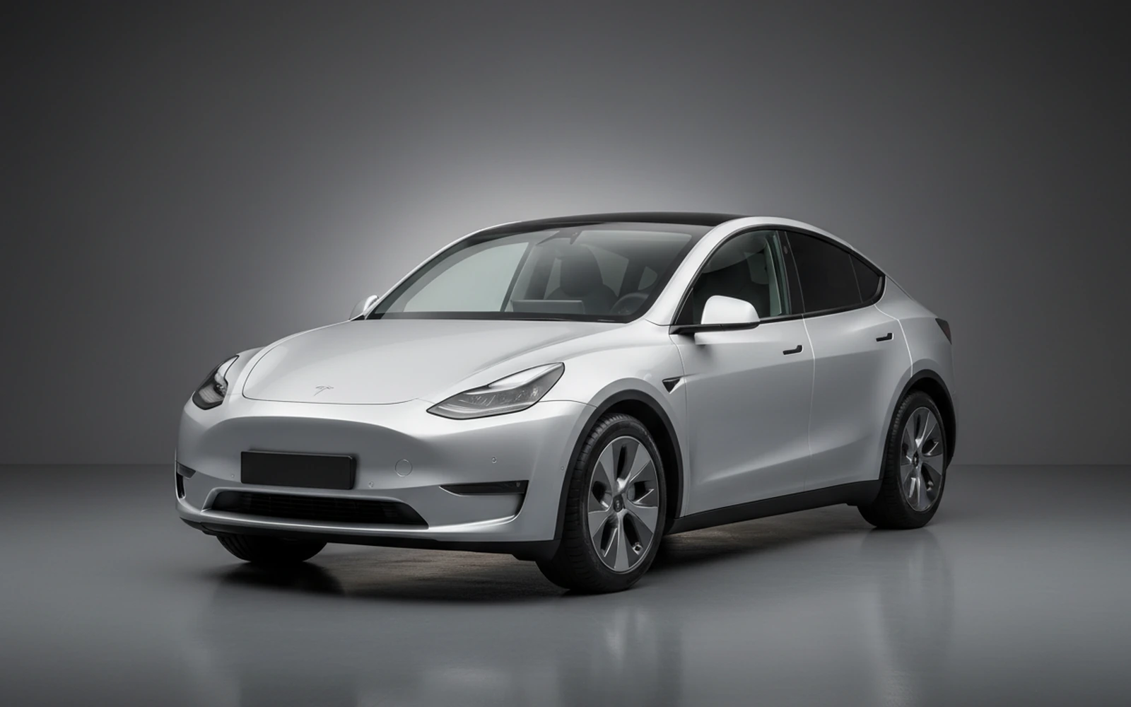 Tesla Model Y Plata 2024 for rent in Miami — exterior front view