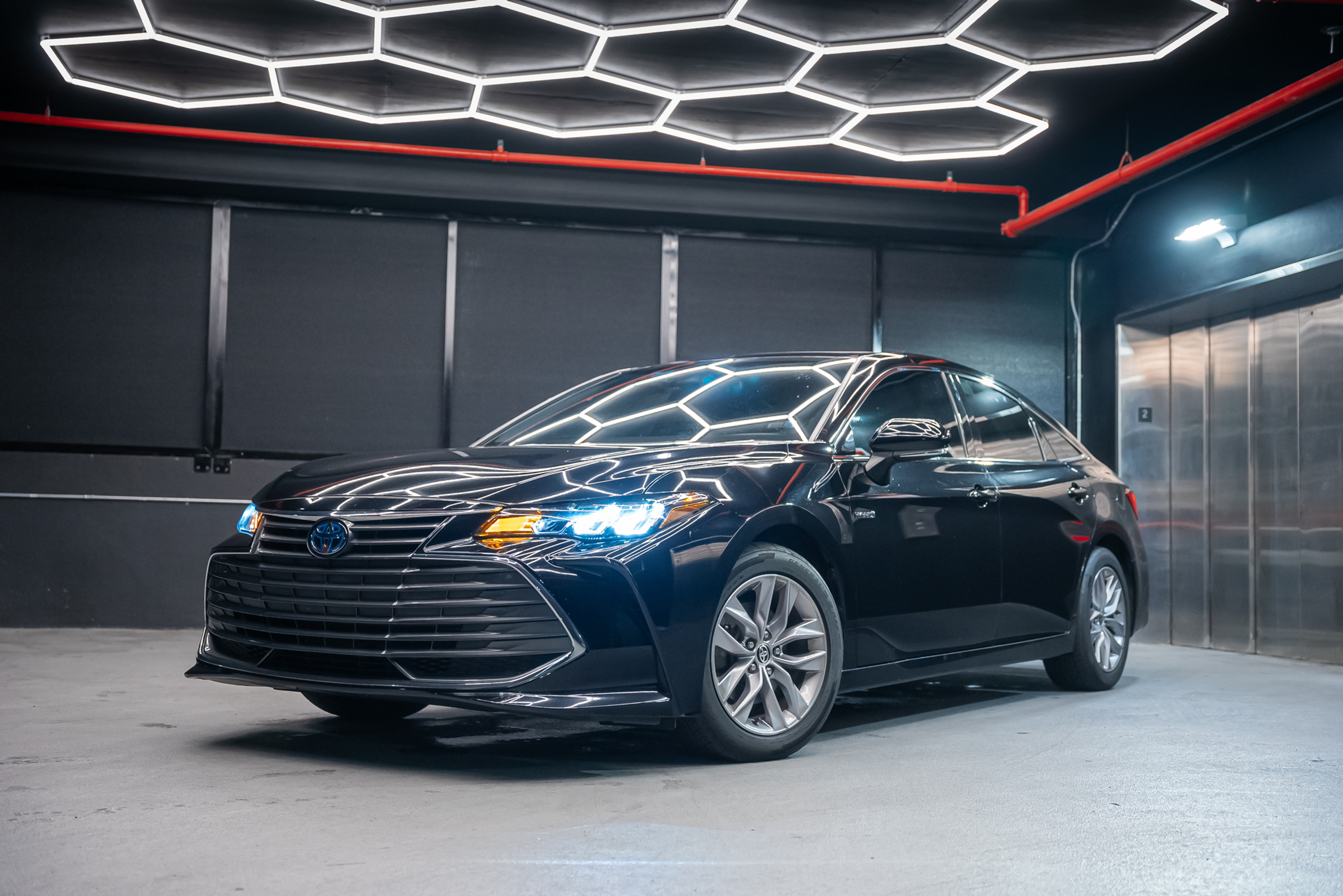 Toyota Avalon White for rent in Miami — exterior photo