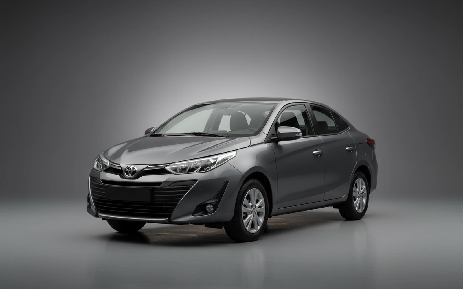 Toyota Yaris Gris 2026 for rent in Miami — exterior front view